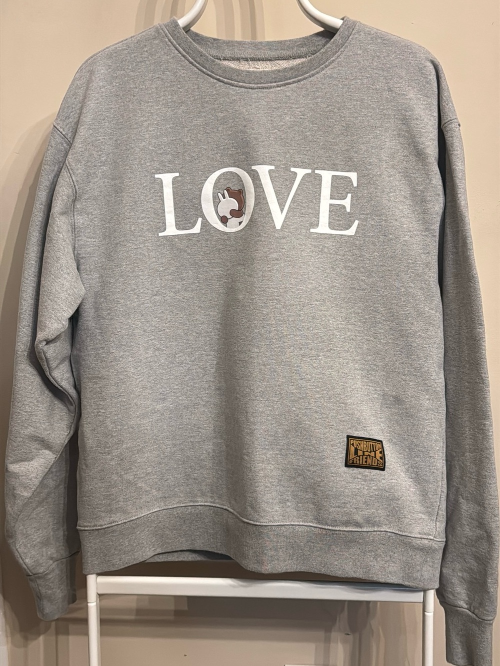 Push button and Gray Crewneck Sweatshirt with White LOVE and Brown Patch Logo